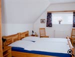 Hofanlage des Mhlenhofes - Wohnungen - Mllerhaus II Schlafzimmer